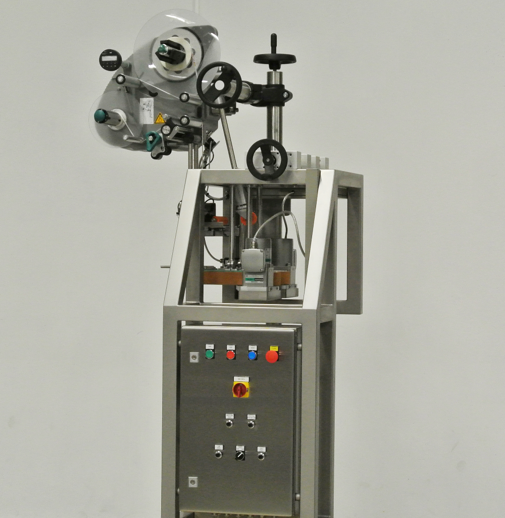 Automatisk påsætning af forseglingsetiket / label på flasker